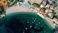 Aerial top down view of boat dock and yacht port in Montenegro. White private motor boats are moored to pier on Adriatic sea coas Royalty Free Stock Photo