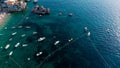 Aerial top down view of boat dock and yacht port in Montenegro. White private motor boats are moored to pier on Adriatic sea coast Royalty Free Stock Photo