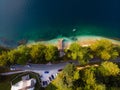 Aerial top down view of the Bohinj lake. Beautiful landscape ot the Triglav mountains, national park, summer forest and the church Royalty Free Stock Photo