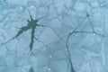 Aerial Top-Down View of Cracked, Broken, and Melting Ice on a Water Surface