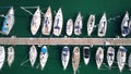 Aerial top-down view of docked sailboats at marina Royalty Free Stock Photo