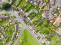 Aerial top down view of mostly semi detached houses seen in a typical English village. Royalty Free Stock Photo