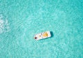 Aerial top down view of a pedalo boat with a girl Royalty Free Stock Photo