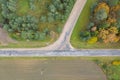 Aerial top down view of road interchange or intersection with single car driving Royalty Free Stock Photo