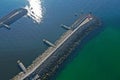 Aerial top down view on sea breakwaters and ship port entrance Royalty Free Stock Photo