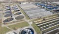 Aerial top down view on sewage treatment facilities. water purification tanks and aeration basins at modern wastewater