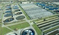 Aerial top down view on sewage treatment facilities. water purification tanks, nd aeration basins at modern wastewater plant