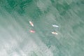 Aerial top down view of sport canoes rowing on the Broken Bow lake, Oklahoma, USA. Royalty Free Stock Photo