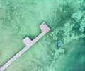 Aerial top down view tropical beach pier caribbean sea at Pasir Panjang. Indonesia Moluccas archipelago, Kei Islands Royalty Free Stock Photo