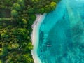 Aerial top down view tropical paradise pristine beach rainforest blue lagoon at Banda Island, Pulau Ay. Indonesia Moluccas Royalty Free Stock Photo