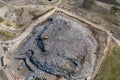 Aerial view of large landfill. Waste garbage dump, environmental pollution