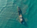 Aerial top view of abandoned ship