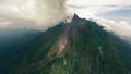 Aerial top view active volcano epic eruption smoke stream disaster natural gas