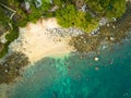 aerial top view Ao Sean small white sand beach lined with rocks.