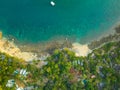 aerial top view Ao Sean small white sand beach lined with rocks.