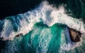 Aerial top view background of big ocean water white wave splashing in the sea to the shore, strength and power of nature Royalty Free Stock Photo