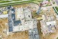 Aerial top view of big building site in residential area under construction Royalty Free Stock Photo