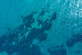 Aerial top view of Blue ocean surface background, View from above shot by drone. Royalty Free Stock Photo