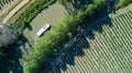 Aerial top view of boat in Canal du Midi from above, family travel by barge and vacation in France Royalty Free Stock Photo