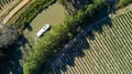 Aerial top view of boat in Canal du Midi from above, travel by barge in Southern France Royalty Free Stock Photo