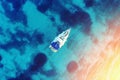 Aerial top view boat or yacht in sea. Summer seascape and luxury vacation