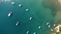 Aerial top view of boats sailing in a blue sea on a sunny day Royalty Free Stock Photo