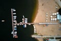 Aerial top view of boats near wooden pier at lake Royalty Free Stock Photo