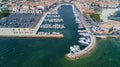 Aerial top view of boats and yachts in marina from above, harbor of Meze town, France Royalty Free Stock Photo