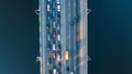 Aerial top view of bridge road automobile traffic jam of many cars from above, city transportation Royalty Free Stock Photo