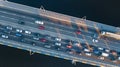 Aerial top view of bridge road automobile traffic jam of many cars from above, city transportation Royalty Free Stock Photo