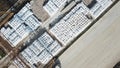 Aerial top view of building materials warehouse. Stock footage. Large storage of construction materials in industrial