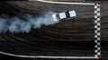 Aerial top view car drifting diffusion race drift car with lots of smoke from burning tires on speed track, Professional driver Royalty Free Stock Photo