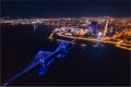 Aerial top view city Krasnoyarsk bridge through Yenisei river evening with neon light Royalty Free Stock Photo