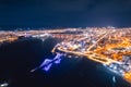 Aerial top view city Krasnoyarsk bridge through Yenisei river evening with neon light Royalty Free Stock Photo