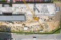 Construction site with working crane. multilevel garage under construction Royalty Free Stock Photo