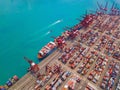 Aerial top view of container cargo ship in the export and import business and logistics international goods in urban city. Royalty Free Stock Photo