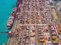 Aerial top view of container cargo ship in the export and import business and logistics international goods in urban city. Royalty Free Stock Photo