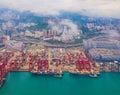 Aerial top view of container cargo ship in the export and import business and logistics international goods in urban city. Royalty Free Stock Photo