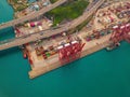 Aerial top view of container cargo ship in the export and import business and logistics international goods in urban city. Royalty Free Stock Photo