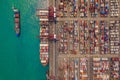 Aerial top view of container cargo ship in the export and import business and logistics international goods in urban city. Royalty Free Stock Photo