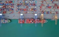 Aerial top view of container cargo ship in the export and import business and logistics international goods in urban city. Royalty Free Stock Photo