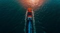 Aerial top view of a container cargo ship in international trade and logistics