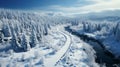Aerial top view Curvy road in snow covered forest in winter