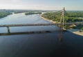 Aerial top view of Dnieper river and Moskovskiy bridge in city of Kiev