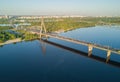 Aerial top view of Dnieper river and Moskovskiy bridge in city of Kiev