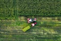 Aerial top view drone photography of a land with sown green fields in countryside Royalty Free Stock Photo