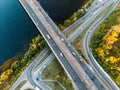 Aerial or top view from drone to road junction, freeway and bridge and car traffic in big city, urban transportation concept Royalty Free Stock Photo