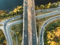 Aerial or top view from drone to road junction, freeway and bridge and car traffic in big city, urban transportation concept Royalty Free Stock Photo