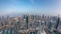 Aerial top view of Dubai Marina day to night timelapse. Modern towers and traffic on the road Royalty Free Stock Photo