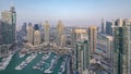 Aerial top view of Dubai Marina day to night timelapse. Modern towers and traffic on the road Royalty Free Stock Photo